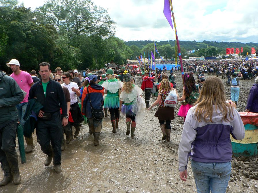 Glastonbury People in the Mud